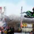 Racers fly through the air during the Fargo national snocross event at Buffalo River Race Park near Glyndon, Minn. on Friday, March 7, 2014. Carrie Snyder / The Forum