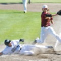 Zach Dukleth (3) of Dilworth-Glyndon-Felton beats the tag at home by Hawleys Parker Hanson (5) during the Minnesota Class 2A, Section 8 championship game in Perham, Minn. on Friday, June 5, 2015. Carrie Snyder / The Forum