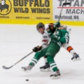 Moorhead’s Will Borgen collides with Roseau’s Gabe Magnusson during the Minnesota Class 2A, Section 8 semifinal game on Saturday, February 21, 2015 in Moorhead, Minn. Carrie Snyder / The Forum