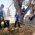 Ten-year-old Ryan Manly, middle, helps his dad Rob rake leaves while his brother Brady, 8, and friend Adam Hansen, 10, right, play outside their north Fargo, N.D. home on Saturday, November 2, 2013. “It’s 30s and crisp. I’ll take it,” said Rob. “It’s a good day to get stuff done.” Carrie Snyder / The Forum