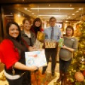 From left, Vanessa Kratzer, Michele Stein, Althea Bain Fick, James Milbrath and Jaymie Emmerich participated in the Secret Santa gift exchange at Gate City Bank in downtown Fargo, N.D. Carrie Snyder / The Forum